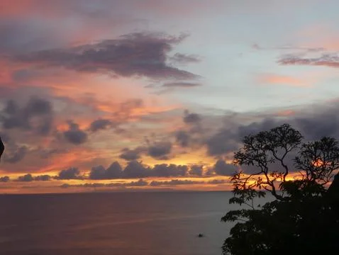 Orange sunset clouds Stock Photos