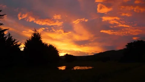 Orange sunset cloudy sky Stock Footage 140611076