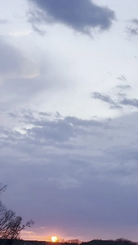 Orange Sunset at Horizon Beneath Dark Clouds Video stock 344900717