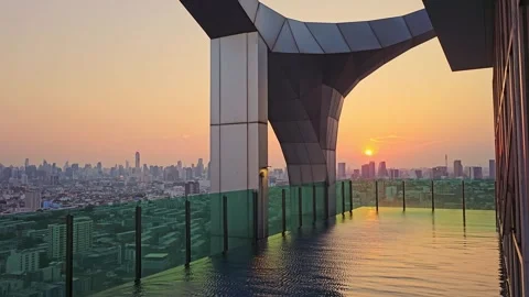 Orange Sunset with Infinity Swimming Pool and City Background in Bangkok, Stock Footage 288930182