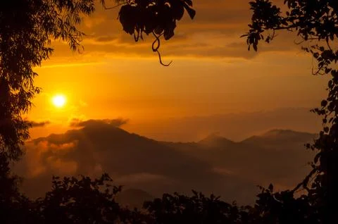 Orange sunset in the mountains Stock Photos