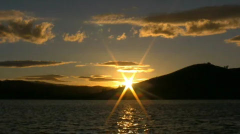 Orange sunset over a lake 2 Stock Footage