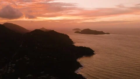 Orange sunset over ocean waves. Seychelles, Mahe. Stock Footage 343957570