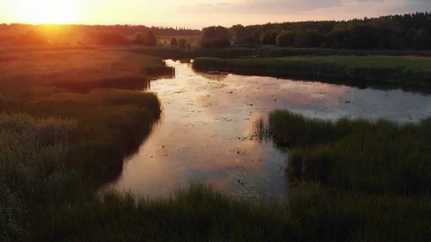 Orange sunset over the river and lake Stock Footage 118160949