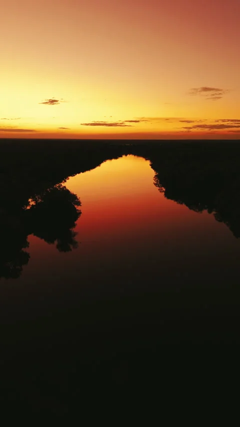 Orange Sunset Over River in Northern Territory, Australia Stock Footage 287986384
