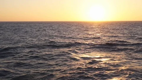Orange sunset over sea - slow motion Stock Footage 77365740
