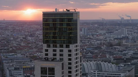 Orange Sunset Skies over Berlins City West skyline buildings at Breitscheidplatz Stock Footage 129767852