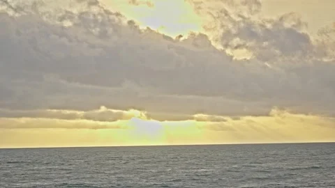 Orange Sunset Sky over Calm Ocean Waves in Tropical Evening Stock Footage 296570089