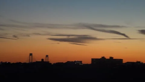 Orange sunset  sky with some wispy clouds Stock Footage 265527491