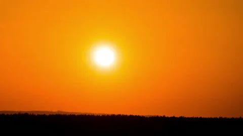 Orange Sunset in Yellow Sky Time Lapse Stock Footage 186227640