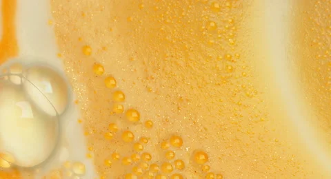 Orange Swirling Bubbles Stock Footage 57467740