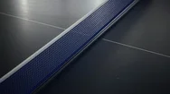 Orange Table Tennis Ball Hit The Net On The Indoor Blue Table In Slow Motion  Stock Footage