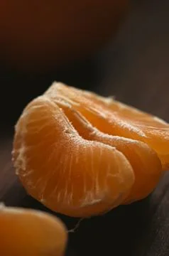 Orange tangerine fruit segment providing healthy snack and fresh citrus fla.. Stock Photos