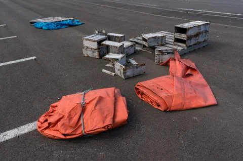 Orange tarp and broken boxes Stock Photos