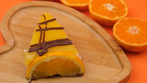 Orange tasty cake Stock Footage 261704968