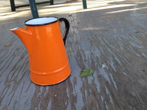 Orange teapot Stock Photos