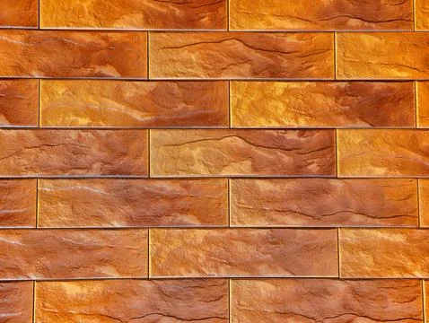 Orange Textured Brick Wall with Rectangular Pattern Modern Copy Space Background Stockfoto's