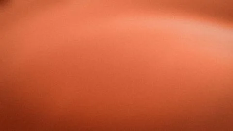 Orange textured grainy background with gradient blur in 4K resolution perfe.. Foto stock