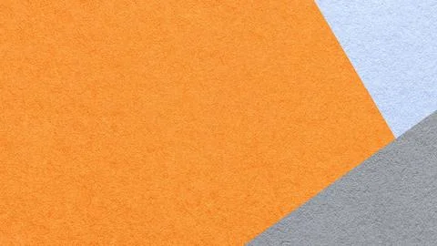 Orange textured paper background with light blue gray triangular corners an.. 스톡 일러스트