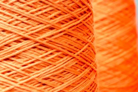 Orange thread Stock Photos