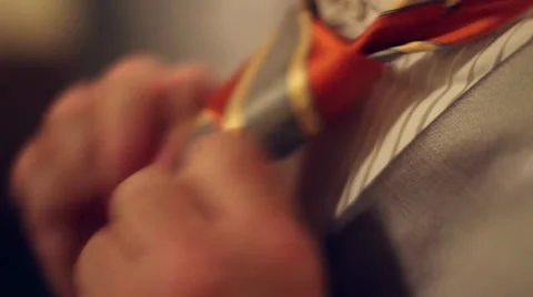 Orange tie adjust Vídeos de archivo 26179163