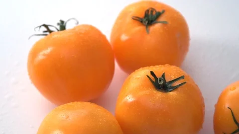 Orange tomatoes Video stock 101057891