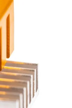 Orange tool rests beside metallic fins Stock Illustration
