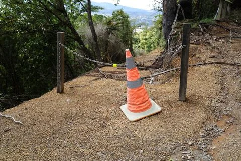 Orange Traffic Cone Blocking Steep Forest Path Fotos Stock