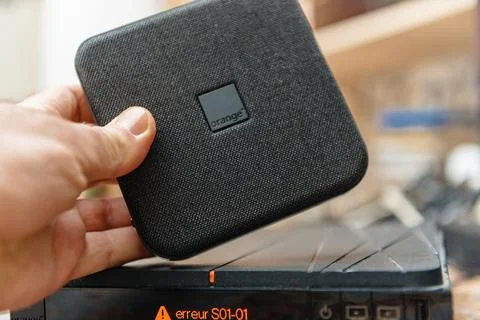 Orange TV Decoder TV 6 with Older Model Stock Photos