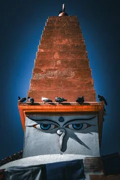 Orange version of Thirteen Steps on Boudhanath Stupa in Kathmandu, Nepal. Stock Photos