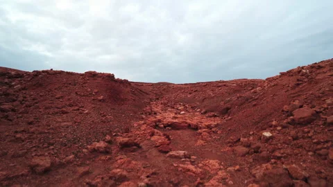 Orange volcanic valley and cloudy horizon Stock Footage 318790882