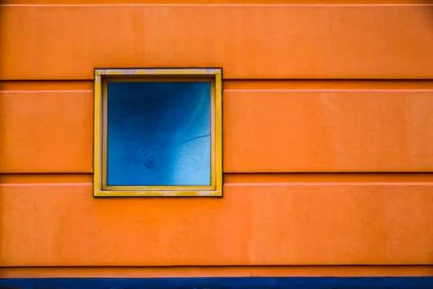 Orange wall and window Stock Photos