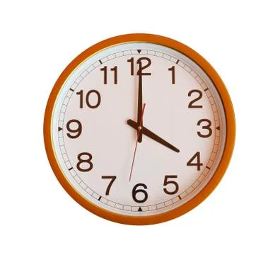 Orange wall clock isolated in four o'clock. Stock Photos