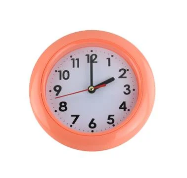 Orange wall clock isolated on white. Stock Photos