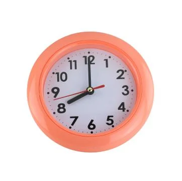 Orange wall clock isolated on white. Stock Photos
