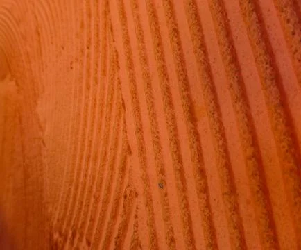 Orange wall with rustic texture made with mortar. Perspective focused. Foto stock