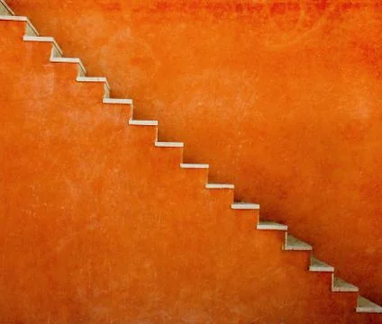 Orange wall with stairs texture background, minimalistic style for base image Stock Photos