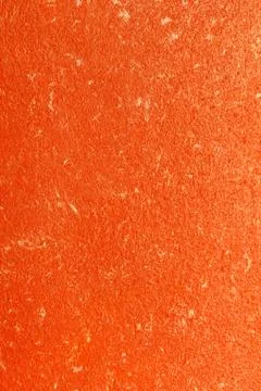 Orange wall texture with white drops Stock Photos