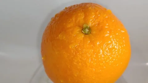 Orange with water droplets Видео 330969775