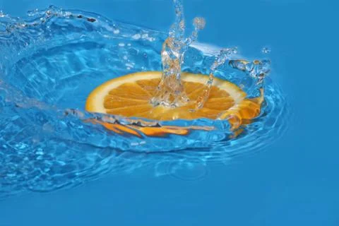 Orange in water Stock Photos
