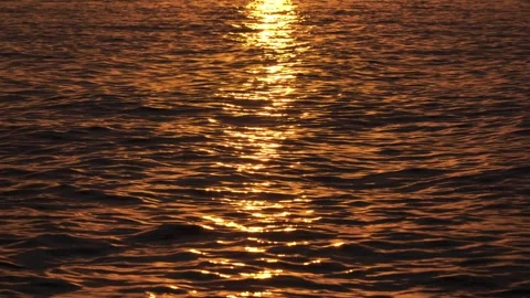 Orange waves of the sea at sunset, background Stock Footage 247352285