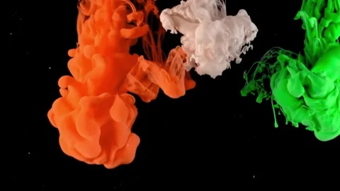 Orange, white and green colored ink drops poured in water. Stock Footage 267018787