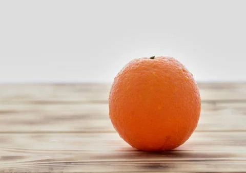 Orange on white background Stock Photos