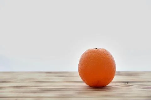 Orange on white background Stock Photos