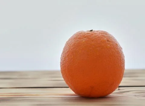 Orange on white background Stock Photos