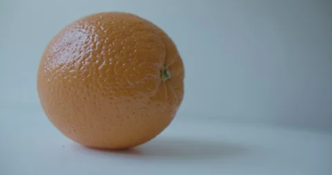 Orange white background tabletop Stock Footage 128023380