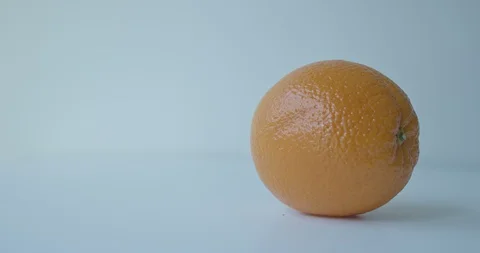 Orange white background tabletop Stock Footage 128078921