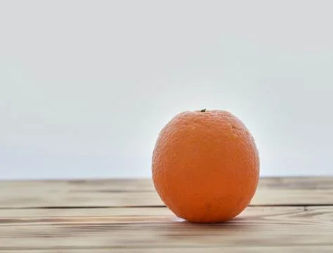 Orange on white Stock Photos