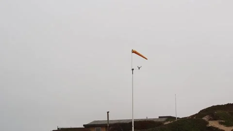Orange Windsock And Cup Anemometer Overcast Sky Stock Footage 341525979