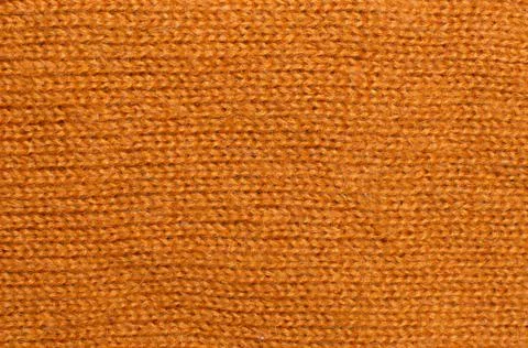 Orange wool knitwork Stock Photos